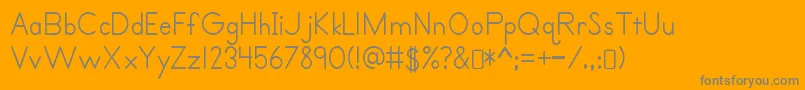 Fonte Primerprint Regular – fontes cinzas em um fundo laranja