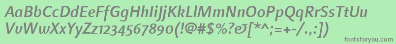 LinotypefinneganosfMediumitalic-fontti – harmaat kirjasimet vihreällä taustalla