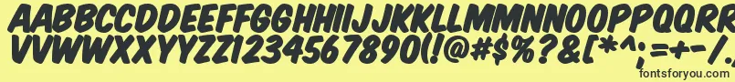 Komtitp Font – Black Fonts on Yellow Background