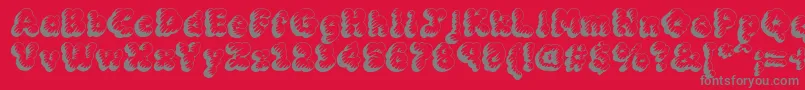 MckloudTempest Font – Gray Fonts on Red Background