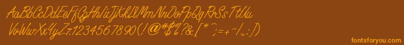 WhisperwriteMedium Font – Orange Fonts on Brown Background