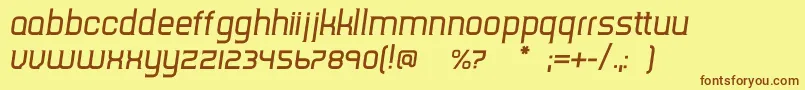 フォントTripserifceItalic – 茶色の文字が黄色の背景にあります。