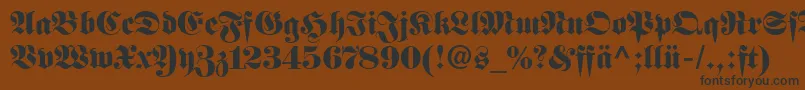 Шрифт FetteFrakturLtDfr – чёрные шрифты на коричневом фоне