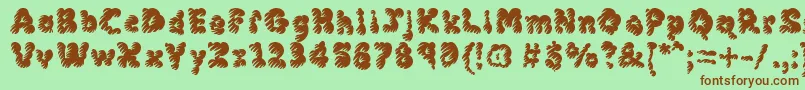 Mcklm-Schriftart – Braune Schriften auf grünem Hintergrund