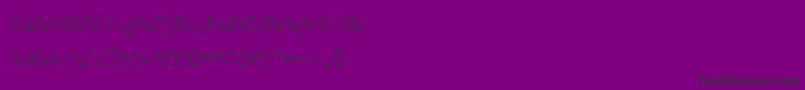 Czcionka AustieBostLiftedUp – czarne czcionki na fioletowym tle