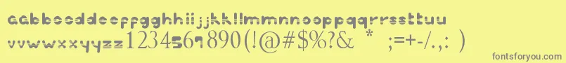 Fonte Inspretta – fontes cinzas em um fundo amarelo