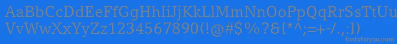 CompatilLetterLtComRegular Font – Gray Fonts on Blue Background