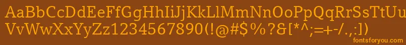 CompatilLetterLtComRegular Font – Orange Fonts on Brown Background