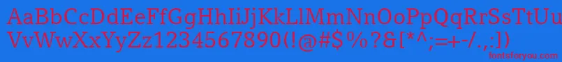 CompatilLetterLtComRegular Font – Red Fonts on Blue Background