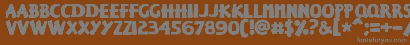 Keisersousa-fontti – harmaat kirjasimet ruskealla taustalla