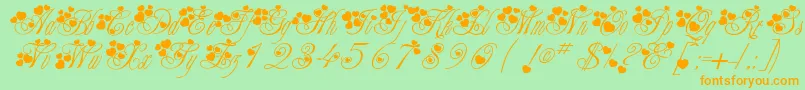 Fancyheartscript Font – Orange Fonts on Green Background