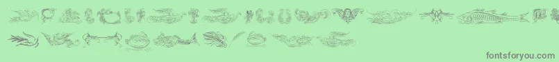 フォントAprendizcaligrafico – 緑の背景に灰色の文字