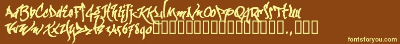 Kgraftrial-fontti – keltaiset fontit ruskealla taustalla