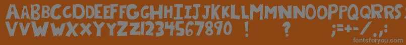 Weitere Informationen zur Chryf-Schriftart Chryf-Schriftart – Graue Schriften auf braunem Hintergrund