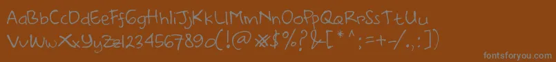 Шрифт DearHandDemo – серые шрифты на коричневом фоне
