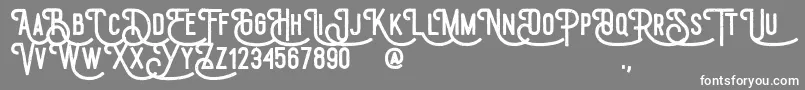 フォントDraconian – 灰色の背景に白い文字