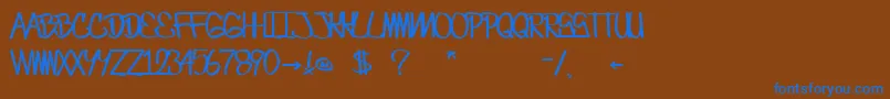Czcionka CrazesFirstFontUpperSkinny – niebieskie czcionki na brązowym tle