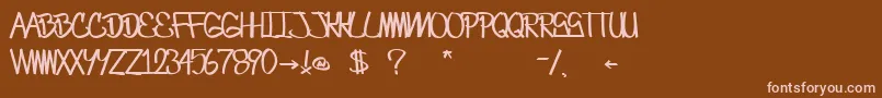 Czcionka CrazesFirstFontUpperSkinny – różowe czcionki na brązowym tle