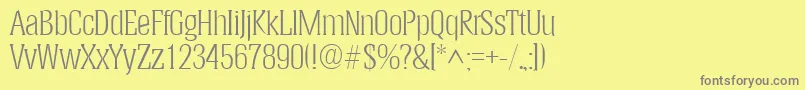 フォントHeliumlhRegular – 黄色の背景に灰色の文字