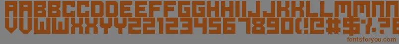 フォントOdeToIdleGaming – 茶色の文字が灰色の背景にあります。