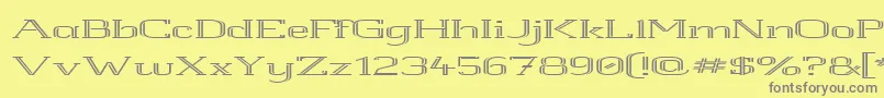 フォントWhitlroll – 黄色の背景に灰色の文字