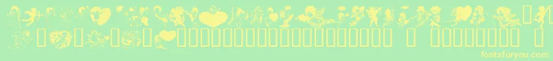 LmCupids Font – Yellow Fonts on Green Background