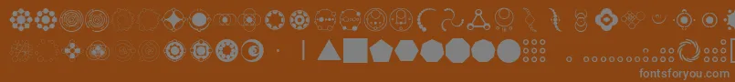 CropCircleDingbats Font – Gray Fonts on Brown Background