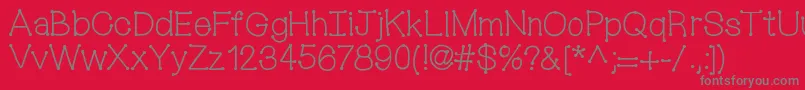 Mixconnectdots-fontti – harmaat kirjasimet punaisella taustalla