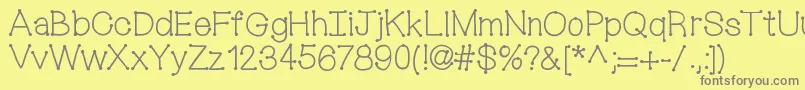 Mixconnectdots-fontti – harmaat kirjasimet keltaisella taustalla