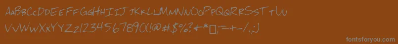 Mchandwriting Font – Gray Fonts on Brown Background