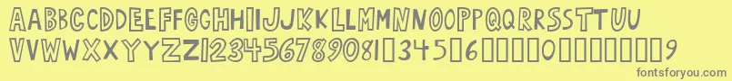 Oarbust ffy-fontti – harmaat kirjasimet keltaisella taustalla