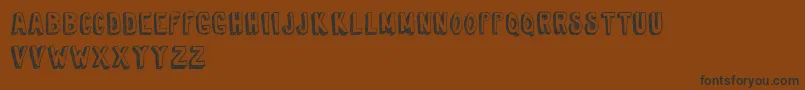 TireShopDemoVersion Font – Black Fonts on Brown Background