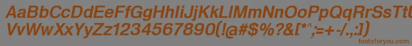 HeldustryftDemiItalic-fontti – ruskeat fontit harmaalla taustalla