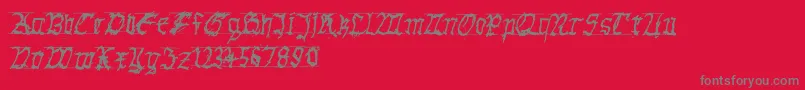 GothichanddirtyBold-Schriftart – Graue Schriften auf rotem Hintergrund