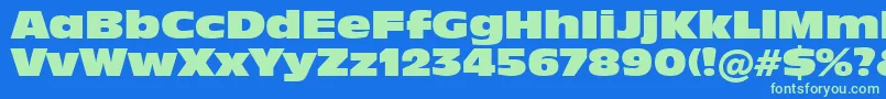 In901xk Font – Green Fonts on Blue Background