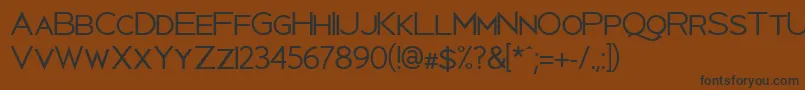 Uberlin Font – Black Fonts on Brown Background