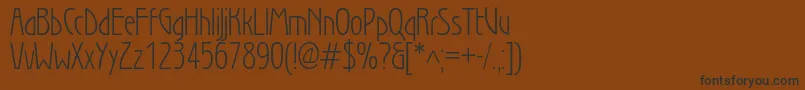 SecessionlightBook Font – Black Fonts on Brown Background