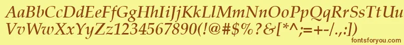 フォントLatinopal5Demiitalicsh – 茶色の文字が黄色の背景にあります。