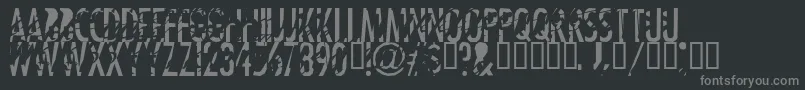 フォントTanline – 黒い背景に灰色の文字