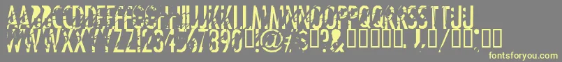 Tanline-fontti – keltaiset fontit harmaalla taustalla