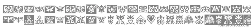 Prtornament1-fontti – harmaat kirjasimet valkoisella taustalla