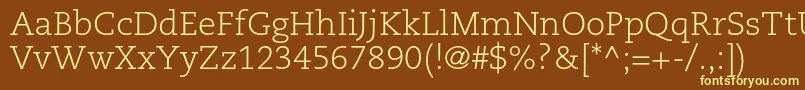 CaecilialtstdLight-fontti – keltaiset fontit ruskealla taustalla