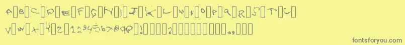 フォントZoe – 黄色の背景に灰色の文字