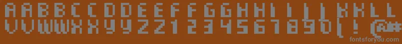 Шрифт CommoMonospaced – серые шрифты на коричневом фоне