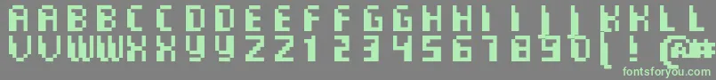 CommoMonospaced-fontti – vihreät fontit harmaalla taustalla
