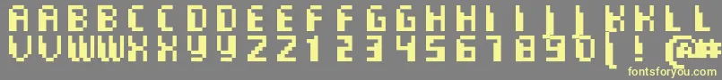 CommoMonospaced Font – Yellow Fonts on Gray Background