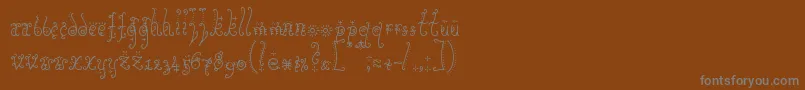 フォントSunflowe – 茶色の背景に灰色の文字