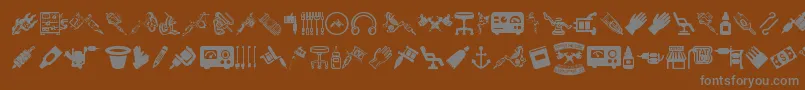 TattooProIcons-Schriftart – Graue Schriften auf braunem Hintergrund