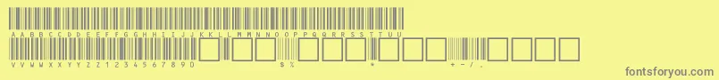 V100020-fontti – harmaat kirjasimet keltaisella taustalla