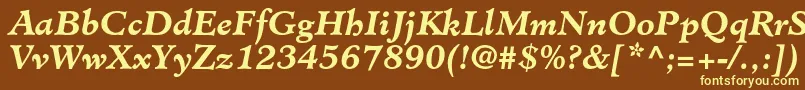 MinisterstdBolditalic-fontti – keltaiset fontit ruskealla taustalla